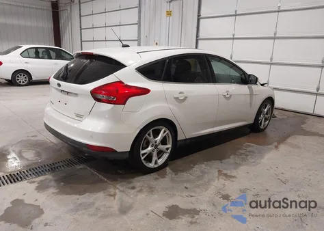2015 Ford Focus Titanium z USA, uszkodzony, nr VIN 1FADP3N29FL314235
